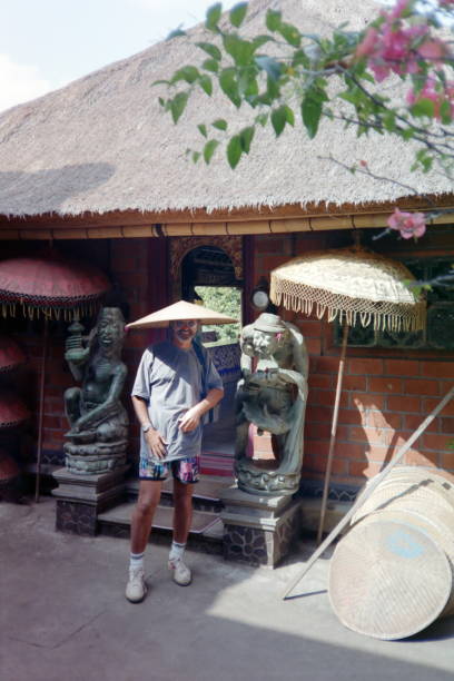 The nineties. A traditional farm bamboo hat to protect against the sun. Ubud. Bali, Java - Indonesia.