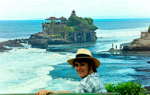 Java, Indonesia, September 1991. Pura Tanah Lot, Sea Water Temple. \nPlease note that the image was scanned from an over thirty years old negative.