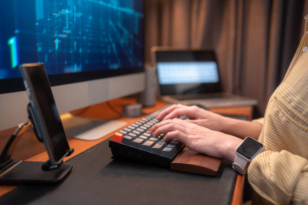 istock Close up  Woman typing and working on computer at home 1359833352
