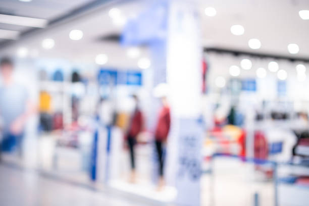 istock Bokeh abstract blur light of inside shopping complex Department store background 1359833801