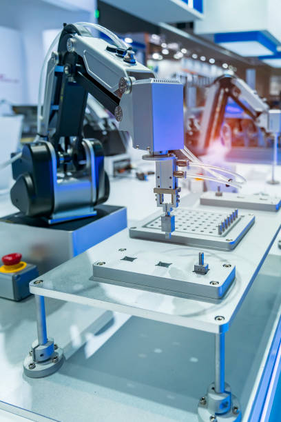 istock Automatic industrial robotic robot working, industry 4.0 and technology concept 1359836142