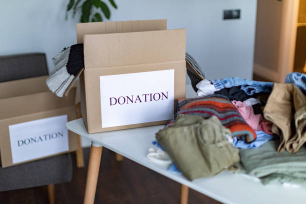 istock Father and son prepping donations 1359837444