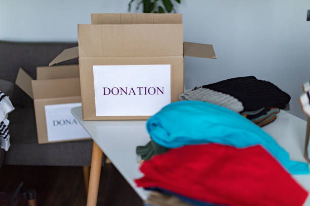 istock Father and son prepping donations 1359837495