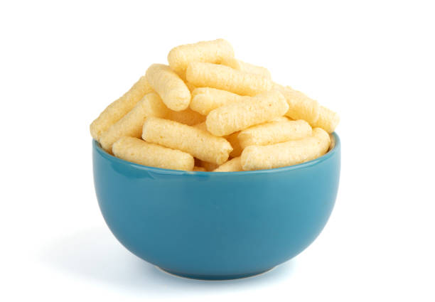 istock Sweet corn sticks in a blue bowl on a white background. 1359842488