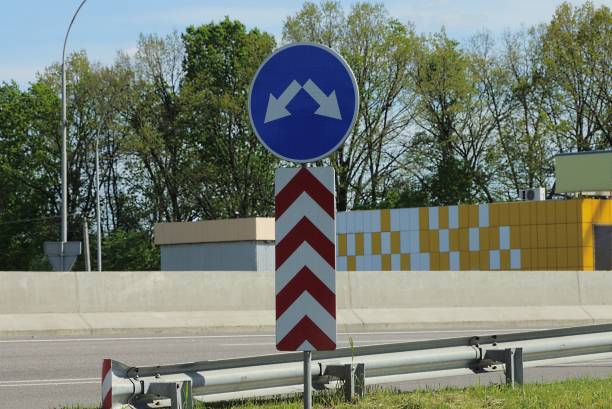 istock two road signs direction indicator and arrow 1359842966