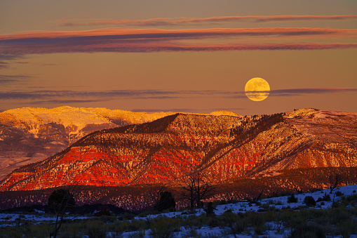 Moon Over Red Canyon Scenic Landscape - Full moon rising in winter beautiful views with snow.