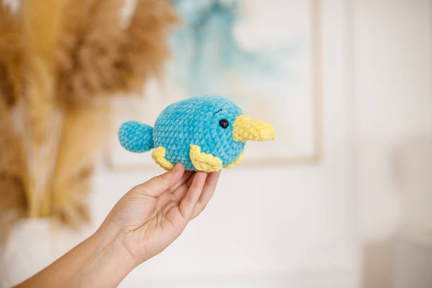 istock Knitted toy for decorating the Christmas tree. 1359856358