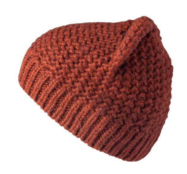 istock women's hat knitted isolated on white background. warm winter accessory 1359856975