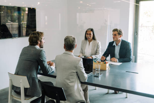istock Business persons on meeting in the office. 1359859035