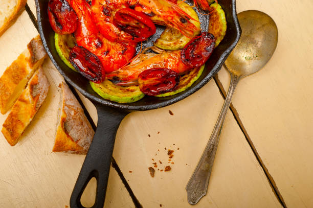 istock roasted shrimps with zucchini and tomatoes 1359860407