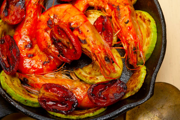 istock roasted shrimps with zucchini and tomatoes 1359861293