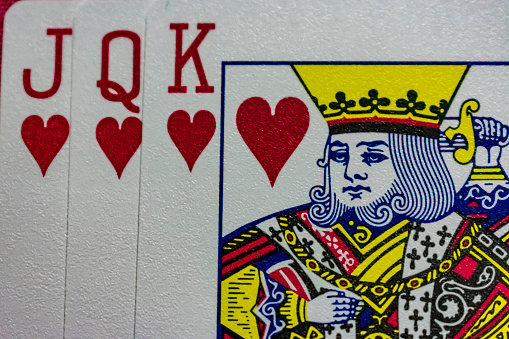 This is the King of Hearts from a well-known deck of vintage /antique (19th century) playing cards. It was printed in chromolithography by Bernard (Bernhard) Dondorf from Frankfurt aM, Germany, and the deck included characters from Shakespeare's plays as face cards. The King of Hearts is illustrated as Henry V (from the play (Henry V)). Bernard (Bernhard) Dondorf opened a lithographic printing business in 1833, first producing playing cards in 1839. His playing cards were popular for their designs and overall quality. He retired from the business in 1872 after producing popular and widely-copied designs for many years.