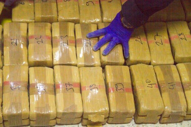 Heroin Packs Confiscated heroin packs cocaine stock pictures, royalty-free photos & images