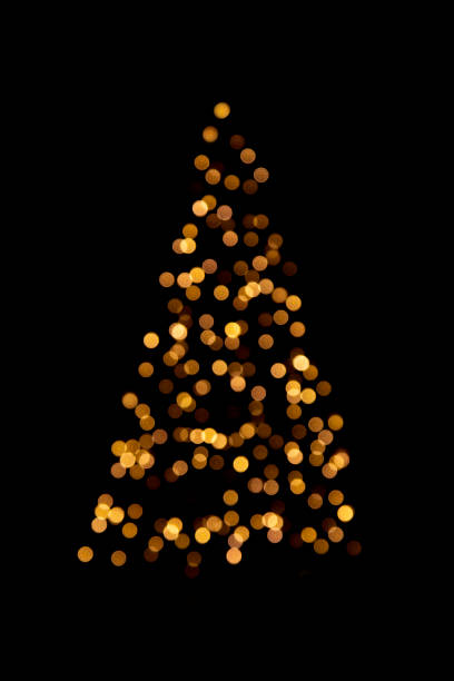 istock Unfocused Christmas lights on Christmas trees on a black background. Copy Space 1359866432