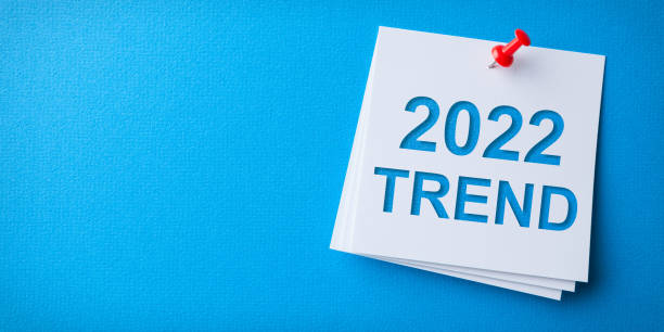 istock Trends 2022 Word in Yellow Sticky Note on Blue Background 1359866529