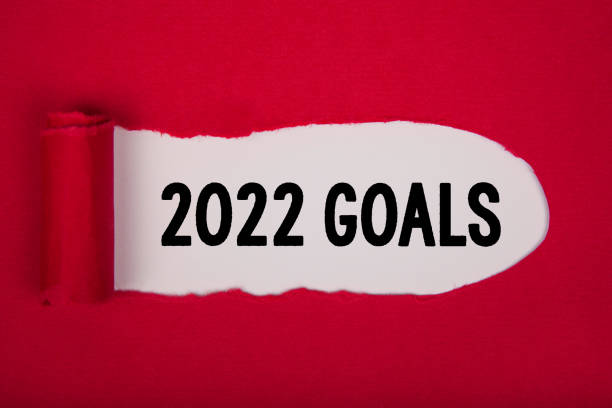 istock Torn Paper With New Year 2022 Goals On White Background 1359867459