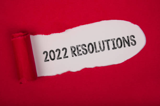 istock Torn Paper With New Year 2022 Resolutions On White Background 1359867465