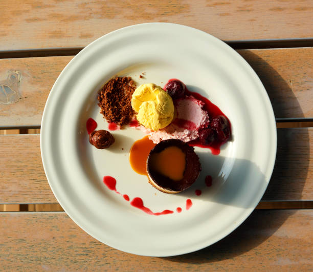 istock upper view with dessert fancy plate. fine dining dessert concept. 1359867529