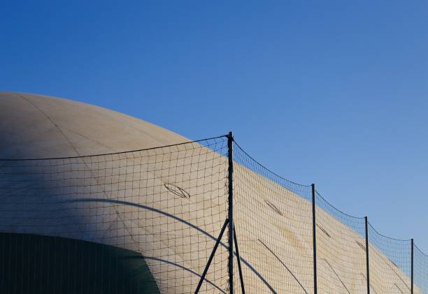 istock A pressure switch structure with a plastic cover of a sports building surrounded by a metallic fence (Pesaro, Italy, Europe) 1359873131