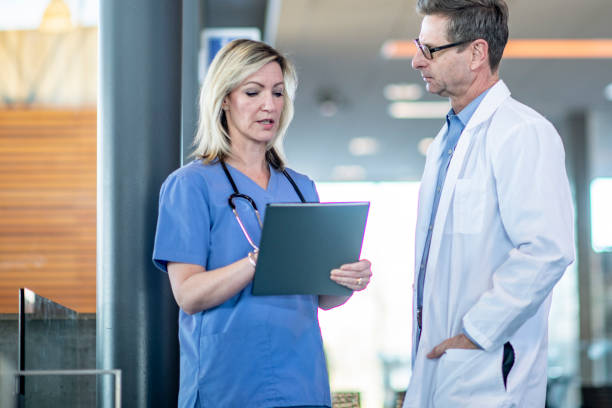 istock Medical Colleagues Discussing a Case 1359874635