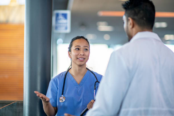 istock Medical Colleagues Discussing a Case 1359874655