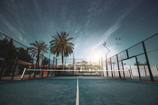 an outdoor paddle tennis court.