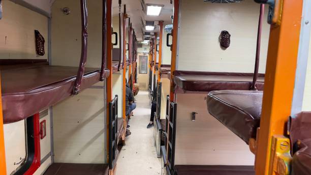 View inside Indian train A view of a sleeper class compartment in an Indian train india train stock pictures, royalty-free photos & images