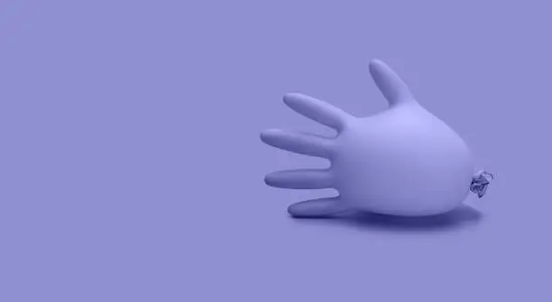 Photo of Violet inflated rubber glove background. Color of the year 2022 Very Peri.