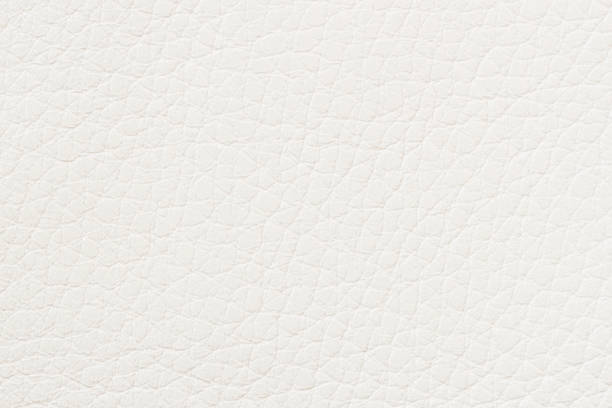 istock Texture of genuine leather, light color. For background, copy space 1359890208