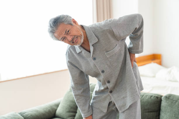 istock elderly man in night clothes in bed,fatigue 1359904722
