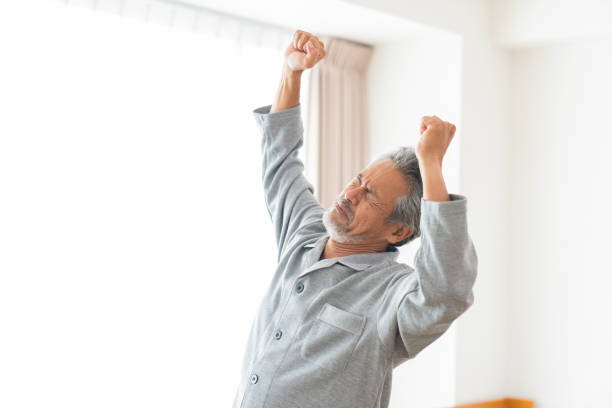 istock elderly man in night clothes in bed,fatigue 1359904732
