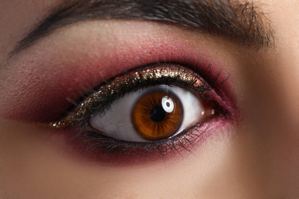 istock Beautiful makeup on young woman brown eye, model for makeup tutorial 1359908597