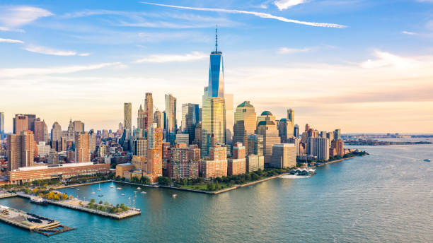 Aerial view of Lower Manhattan skyscrapers Aerial view with Lower Manhattan skyline at sunset viewed from above Hudson River new york state stock pictures, royalty-free photos & images