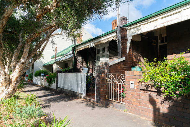 istock Footpath leading past row houses in leafy suburb 1359916208