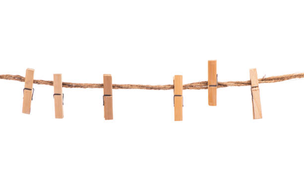 istock Clothespins with the rope on a white background 1359923346