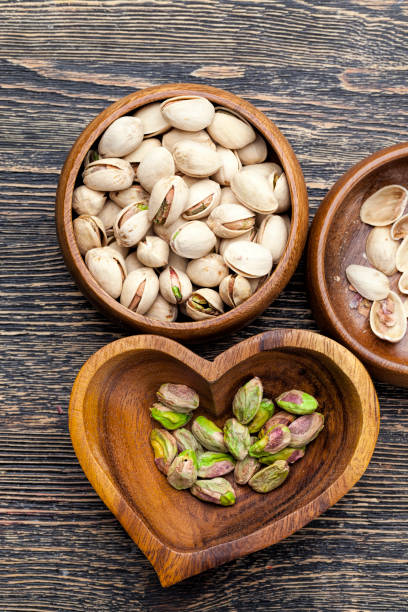 istock delicious fried salted pistachio nuts 1359924507