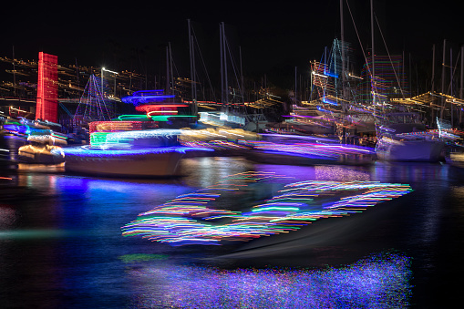 Christmas boat parade cruises around the harbor during the holiday season.