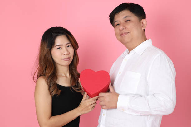 istock Pink Asian Couple 1359928614