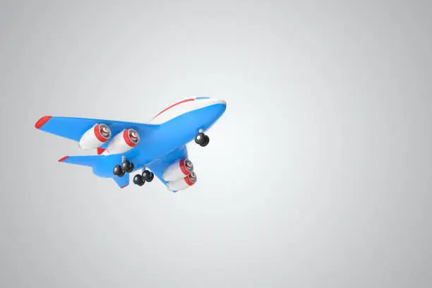 Photo of 3D rendering blue miniature flying plane toy on a white isolated background