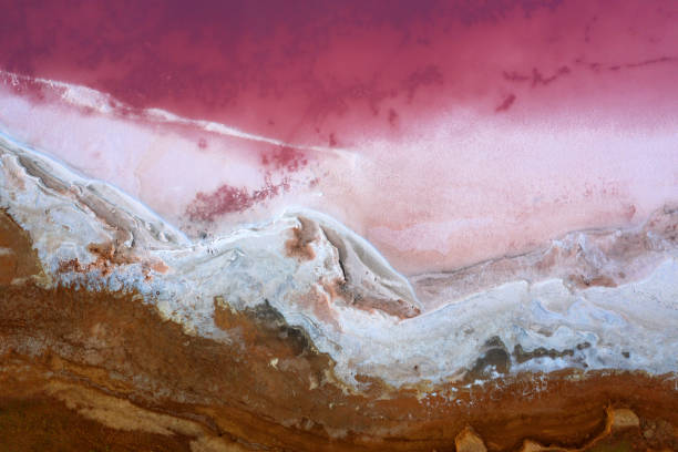 istock Pink lake water and salt top view 1359947155