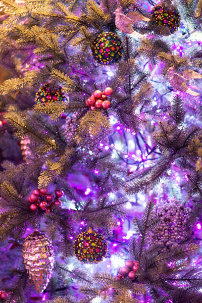 istock Christmas tree in purple tones. text, abstract background 1359948059