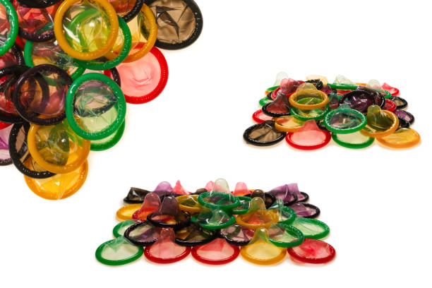 istock Colorful condoms background. 1359950254