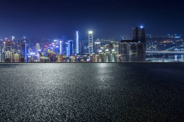 istock Panoramic skyline and modern commercial buildings with empty road 1359951084