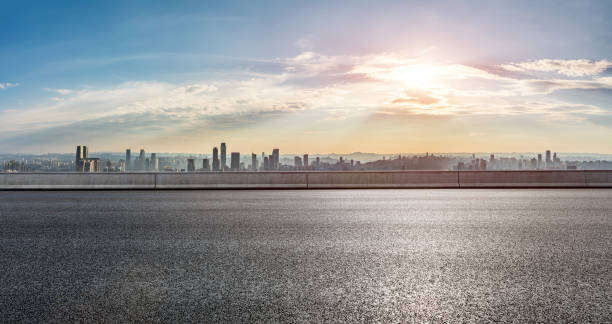 istock Panoramic skyline and buildings with road 1359951288
