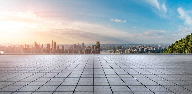 Empty floor with city skyline and buildings