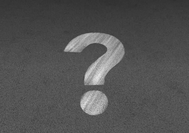 istock Illustration of a question mark drawn on a black background with white chalk 1359952531