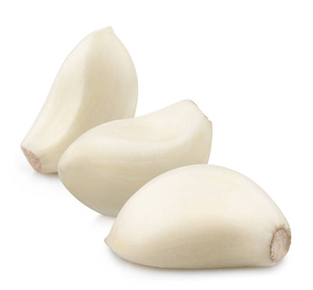 istock Delicious white garlic cloves on white 1359954529