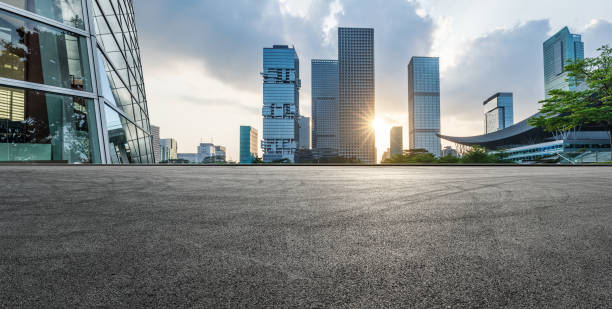 istock Panoramic skyline and modern commercial office buildings with empty road 1359954890