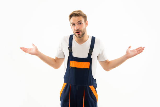 istock confused male quality inspector. construction worker isolated on white. 1359957299