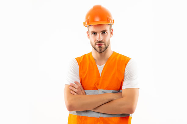 istock male road repair or construction worker isolated on white. builder in hardhat 1359957567
